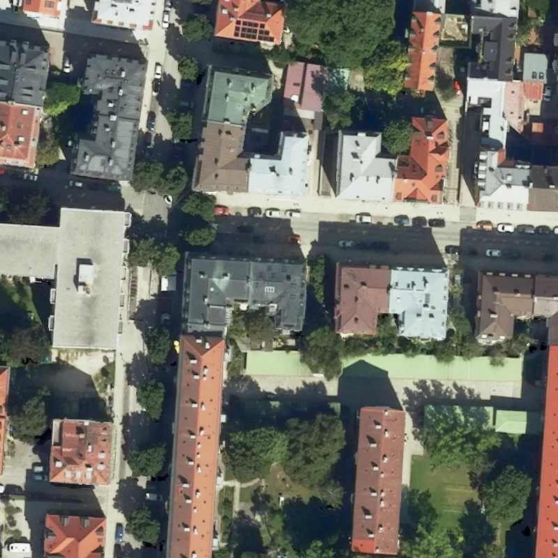 Luftbild der Oberländerstraße 29 über den Dächern von Sendling